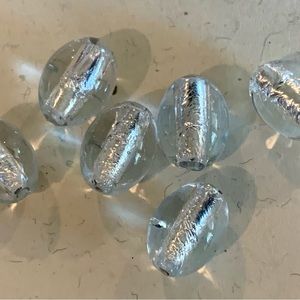 Limited quantities…12 lamp work foil glass beads